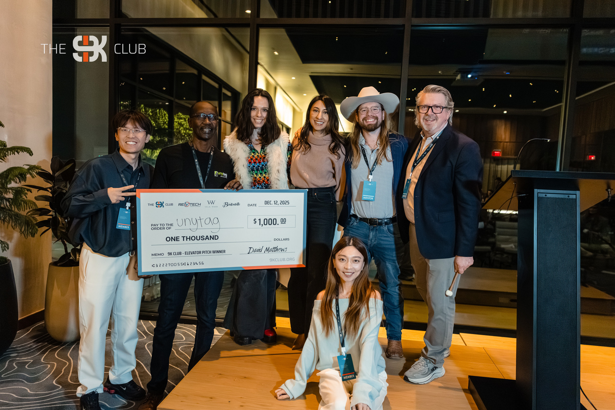 UnyTag receiving the $1,000 Elevator Pitch award at the 2025 9K Club Final